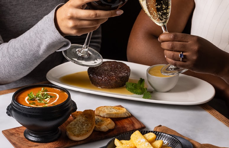 Intimate celebration venue with premium table setting for special occasions